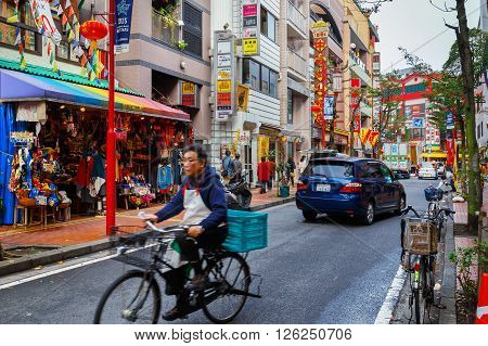 YOKOHAMA JAPAN - NOVEMBER 24 2015: Yokohama Chinatown is Japan's largest chinatown. A large number of Chinese stores and restaurants can be found in the narrow and colorful streets