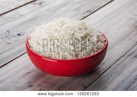 cooked white rice in a bowl, plain basmati rice, cooked basmati rice in ceramic bowl