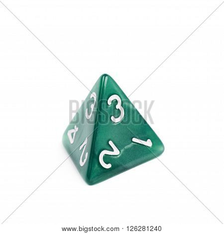 Green roleplaying polyhedral tetrahedron gaming plastic dice isolated over the white background