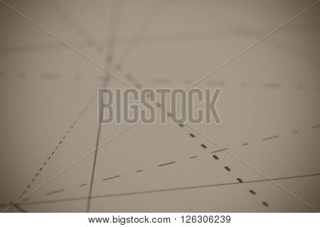 Black Pins In Paper Linked By Lines