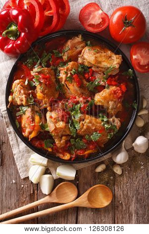 Chicken Stew With Vegetables On A Table Close-up. Vertical Top View