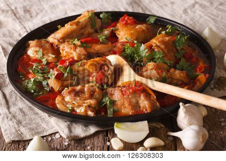 Chicken Stew With A Tomato, Onion And Pepper Close-up. Horizontal