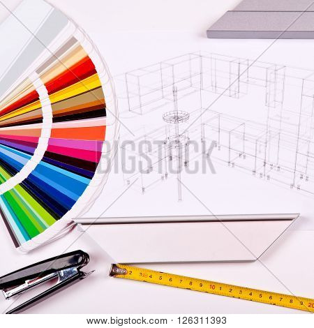 construction and architectural design concept. 3D visualization of the kitchen project under construction with wooden and plastic panels, color palette and a tape measure on a blurry figures.