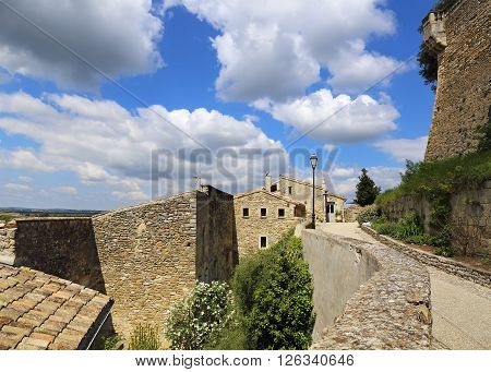 Landscape of southern France: old stone houses of the medieval village Grignan