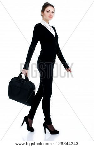 Happy successful business woman in black suit