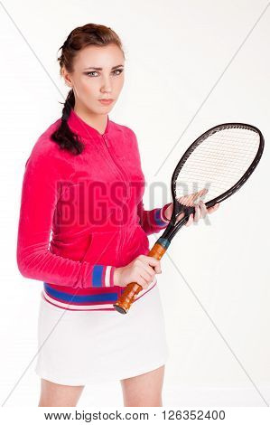 athletic nice girl with a tennis racket