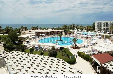 Side, ANTALYA, TURKEY - JUNE 02, 2015: View of the pool and the beach from the hotel Calimera Kaya Side, Turkey.