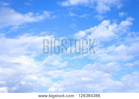 Blue sky with spindrift clouds may be used as background.
