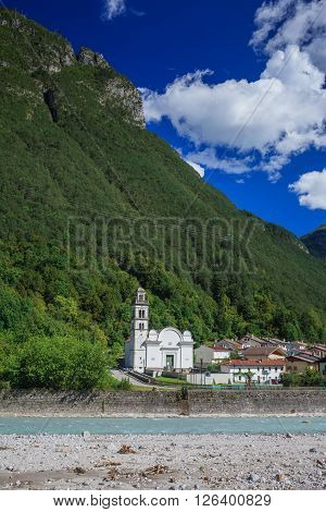 Italian Alps - view to church and river Adige in Stava