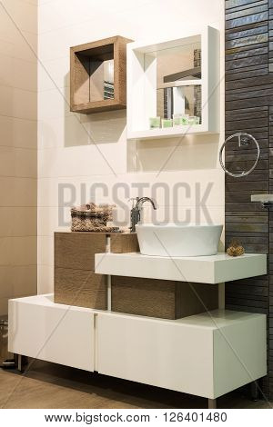 Sink and mirror in modern bathroom interiror