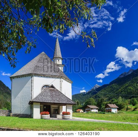 View to church in Dolomite mountains. Italian Alps. Panorama