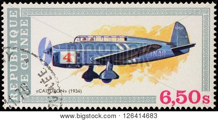 MOSCOW RUSSIA - APRIL 17 2016: A stamp printed in Guinea shows old aircraft Caudron (1934) series 