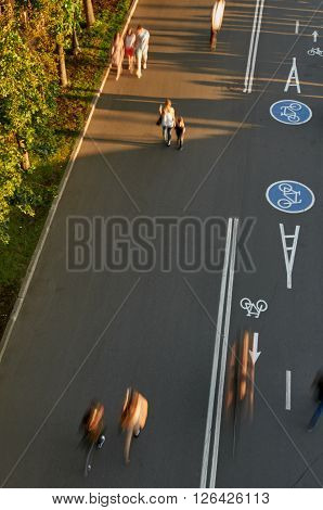 pedestrian zone in Moskow. Pushkinskaya embankment. walking people in motion. photographed from above. from Novoandreevsky bridge.
