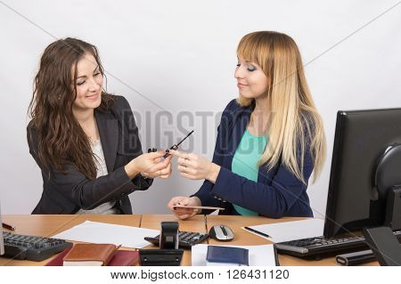 Office Workers Talking Enthusiastically About Cosmetics At Your Desk