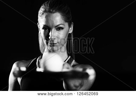 Young Woman Holding Racket With Ball