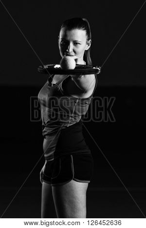 Portrait Of Young Beautiful Woman Playing Tennis