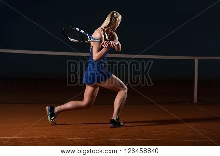 Tennis Player Hitting Tennis Ball