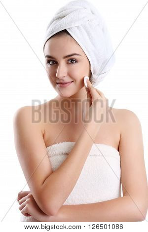 Young spa woman touching her face after beauty treatment