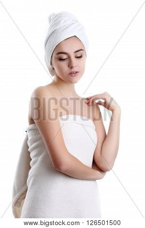 Young spa woman touching her face after beauty treatment