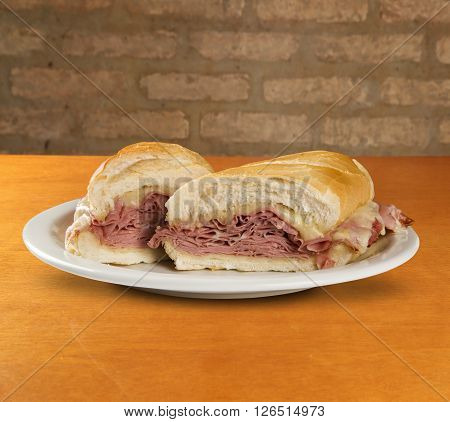 Mortadella traditional Italian sausage sandwich. Wood background.