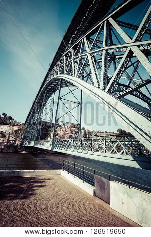 City of Porto in Portugal. Ponte Luiz I Bridge over Douro river and historic architecture of the Old Town.