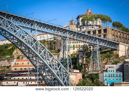 City of Porto in Portugal. Ponte Luiz I Bridge over Douro river and historic architecture of the Old Town.