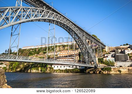 City of Porto in Portugal. Ponte Luiz I Bridge over Douro river and historic architecture of the Old Town.
