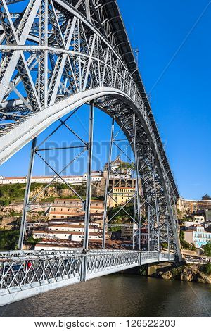 City of Porto in Portugal. Ponte Luiz I Bridge over Douro river and historic architecture of the Old Town.