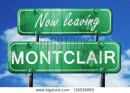 Now leaving montclair road sign with blue sky