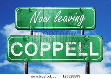 Now leaving coppell road sign with blue sky