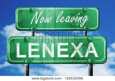 Now leaving lenexa road sign with blue sky