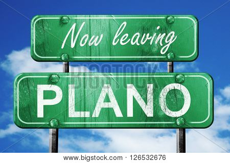 Now leaving plano road sign with blue sky