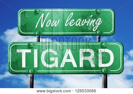 Now leaving tigard road sign with blue sky