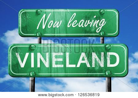Now leaving vineland road sign with blue sky