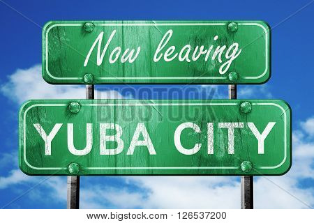 Now leaving yuba city road sign with blue sky