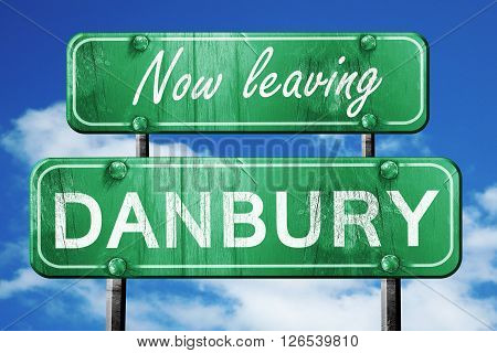 Now leaving danbury road sign with blue sky