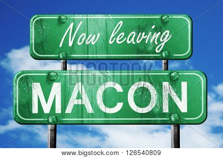 Now leaving macon road sign with blue sky