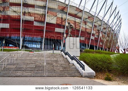 Warsaw, Poland - April 09, 2016: A statue of legendary Polish football coach Kazimierz Gorski. Kazimierz Gorski was the coach for the Polish national team in 73 matches with 45 wins.