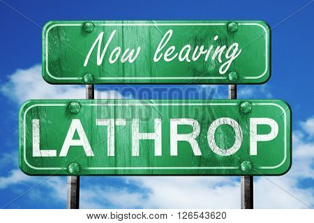 Now leaving lathrop road sign with blue sky