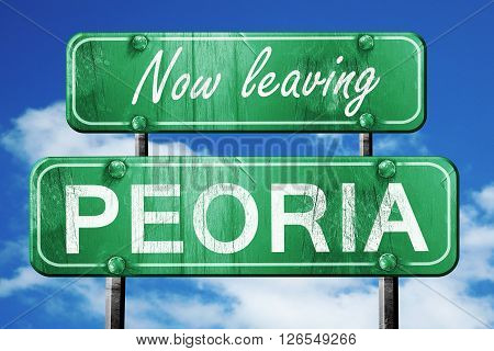 Now leaving peoria road sign with blue sky