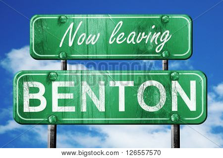Now leaving benton road sign with blue sky