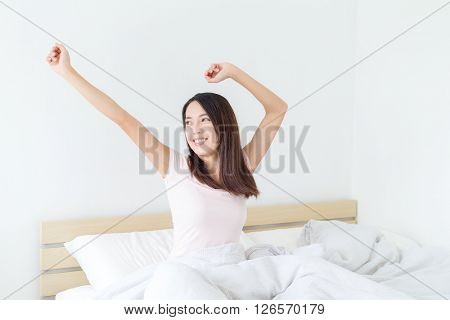 Woamn hand raise up at morning