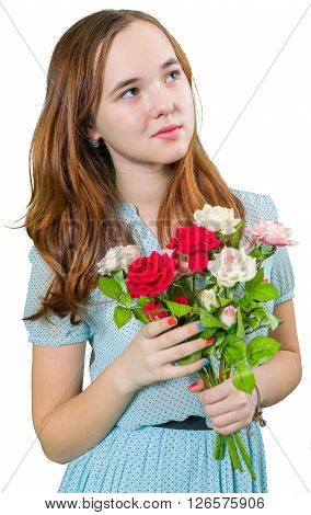 Beautiful teengirl in blue dress with bouquet of flowers on white background