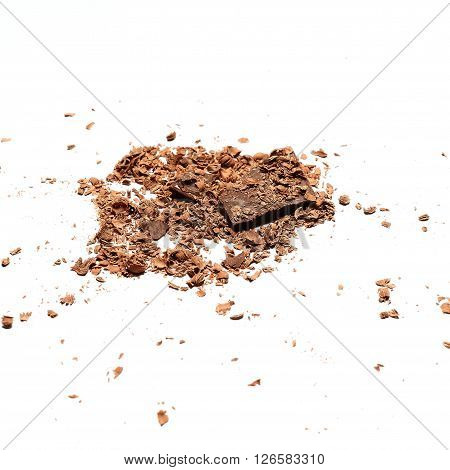 Pieces of the chocolate covered by the laminae and shavings