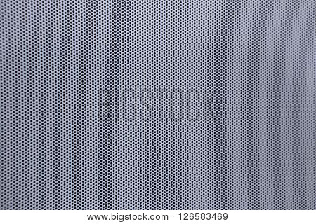 White perforated sheep with little holes and  blurred margins