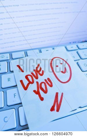 note on computer keyboard: i love you