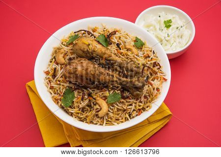 chicken biryani with leg piece, favourite non veg dish in india and pakistan