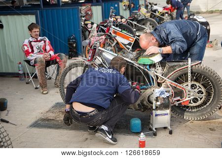 Mechanic Prepair Motorcycle For Race