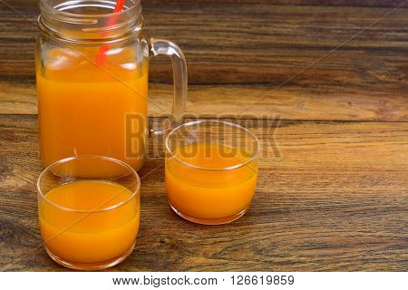 Healthy food: pumpkin juice, apple, orange, multifruit. Studio Photo