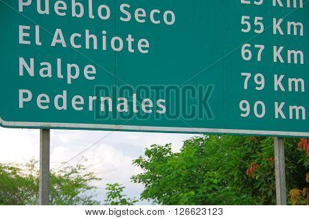 Portoviejo, Ecuador - April, 18, 2016: Street sign showing towns in the Manabi province that have been affected by the 7.8 earthquake